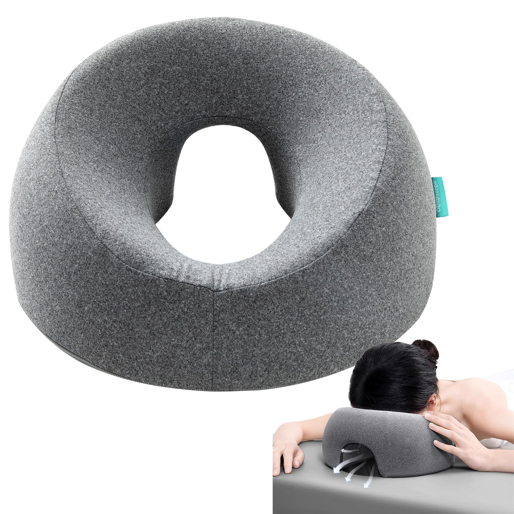 xiaomubiao face-down pillow on massage table offers comfortable back support.