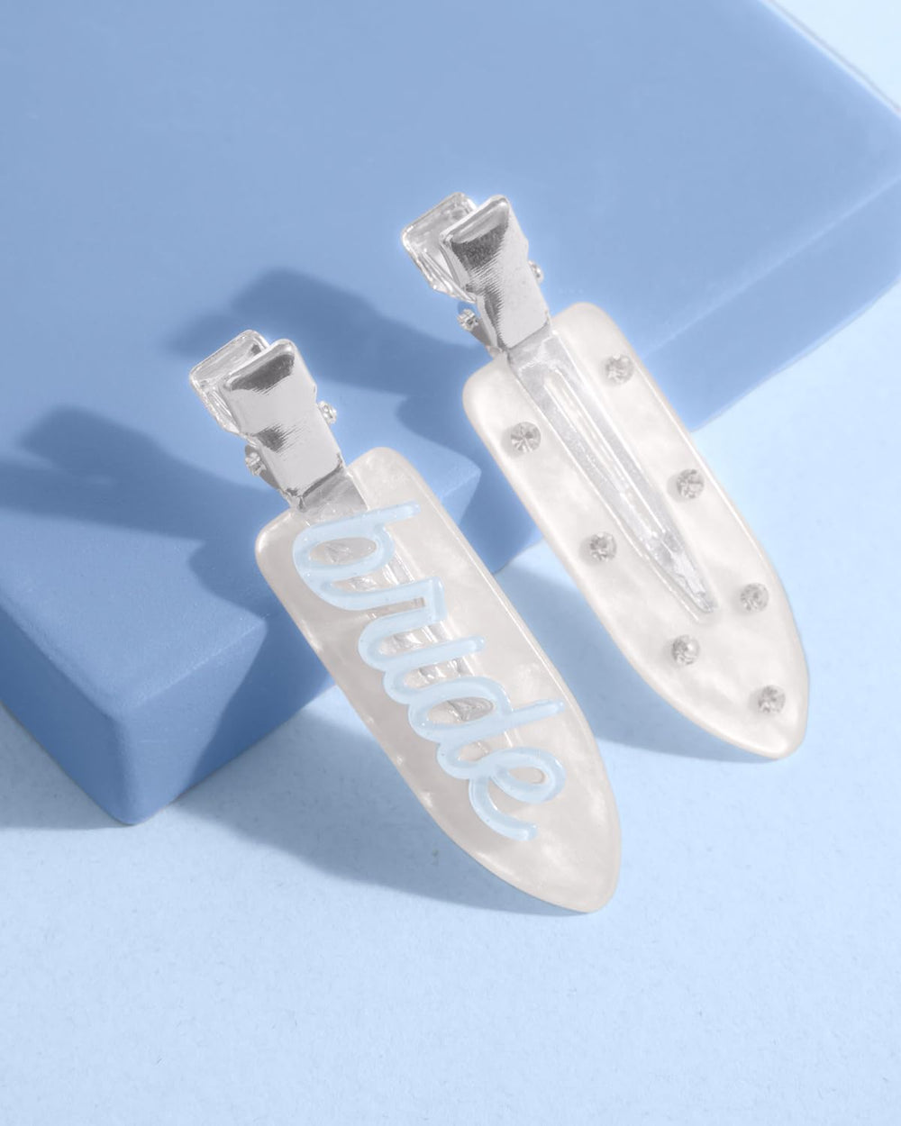 xo, Fetti Bride Beauty Clip with blue cursive bride text for coordinated bachelorette party looks.
