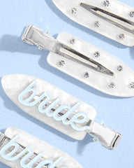 xo, Fetti Bride Beauty Clip with rhinestones adds subtle shine during wedding prep.