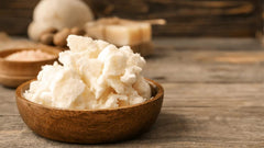 Yajna Cocoa Butter on face and body for deep hydration.