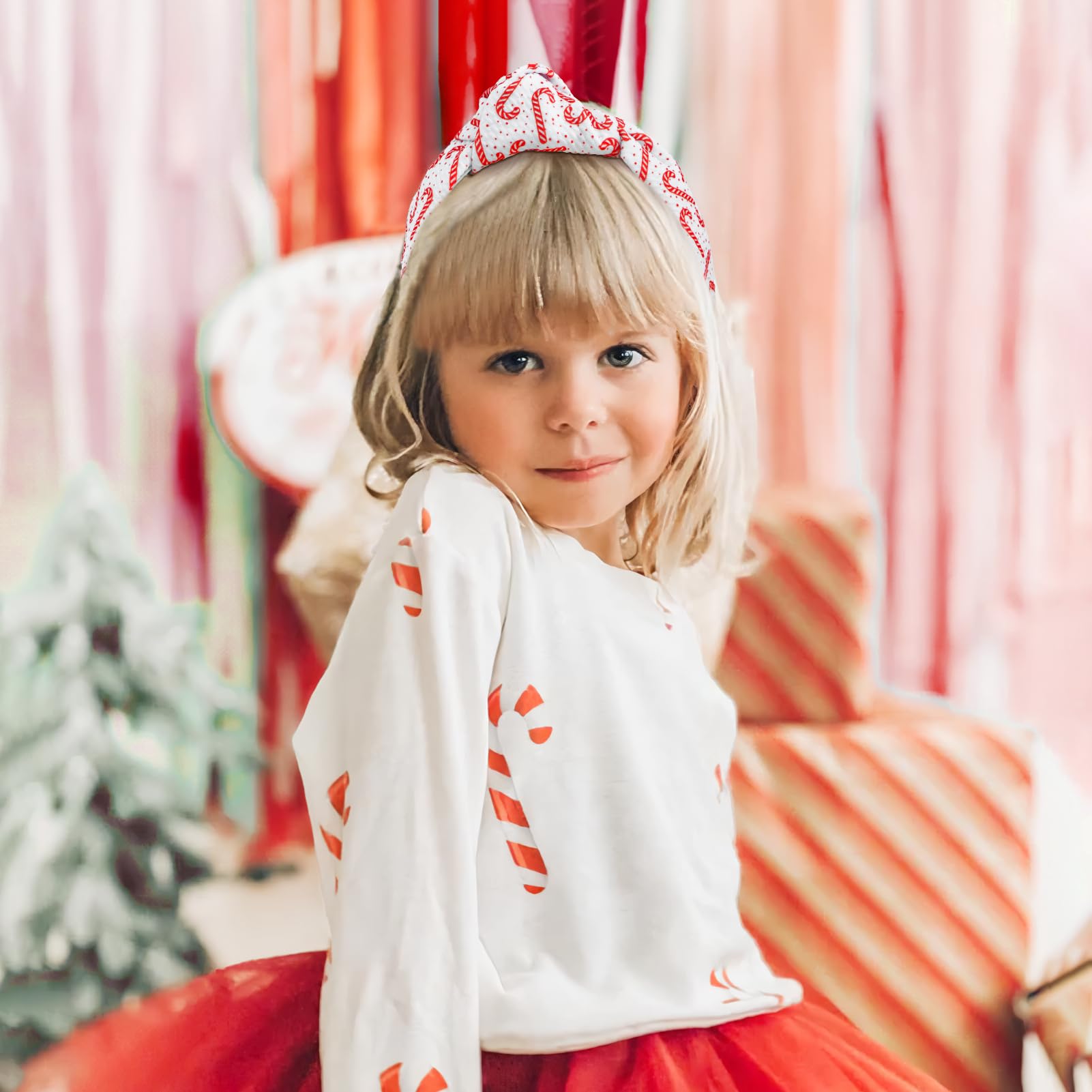 YanJie top knot headband reindeer print closeup emphasizes versatile holiday look.