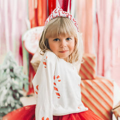 YanJie top knot headband reindeer print closeup emphasizes versatile holiday look.
