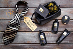 Yard House leather dopp kit opens to reveal premium grooming essentials for travel.