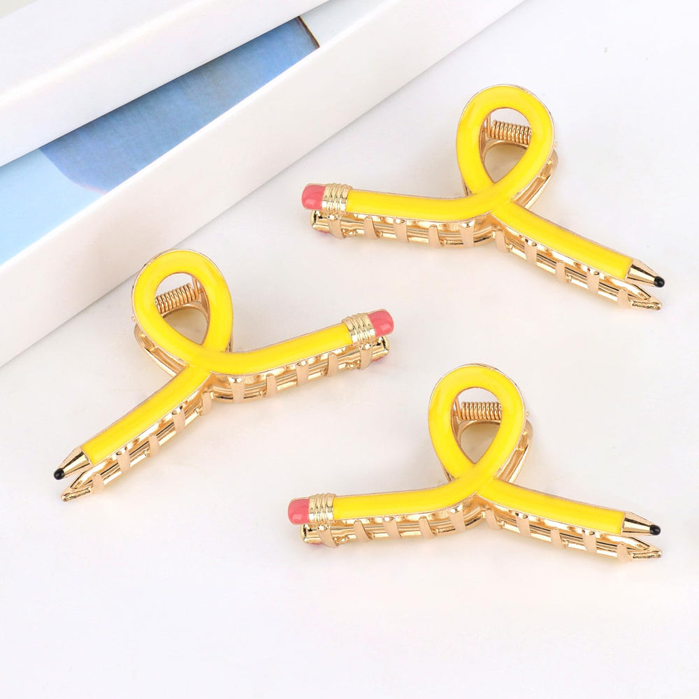 YARIEW pencil hair clip yellow on purse illustrating compact accessory.