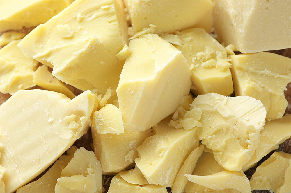 Yellow Brick Road RAW Cocoa Butter pour reveals rich texture for moisturizers and lip balms.