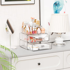 Yieach 3-tier clear acrylic organizer two drawers neatly store skincare and cosmetics.
