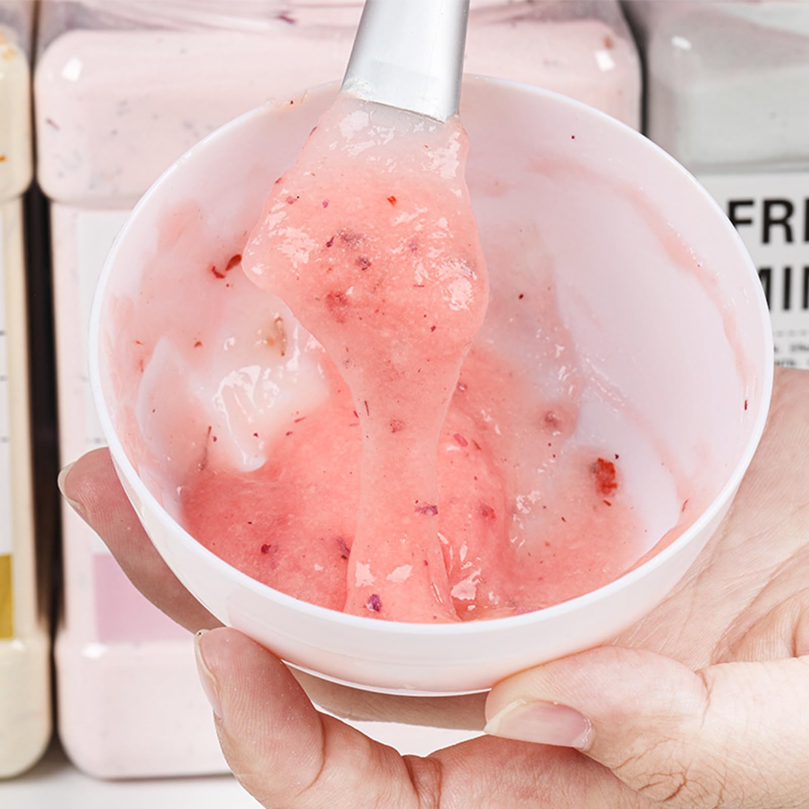 YMEYFAN jelly mask application closeup showing smooth spread on skin.