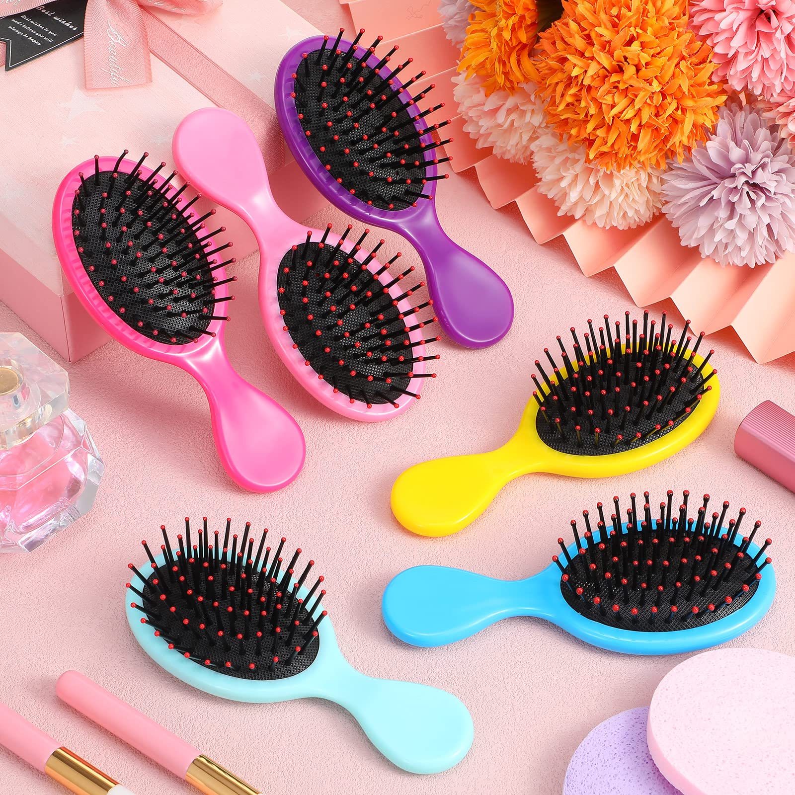 Yoande compact travel hairbrush is easy to hold and carry.