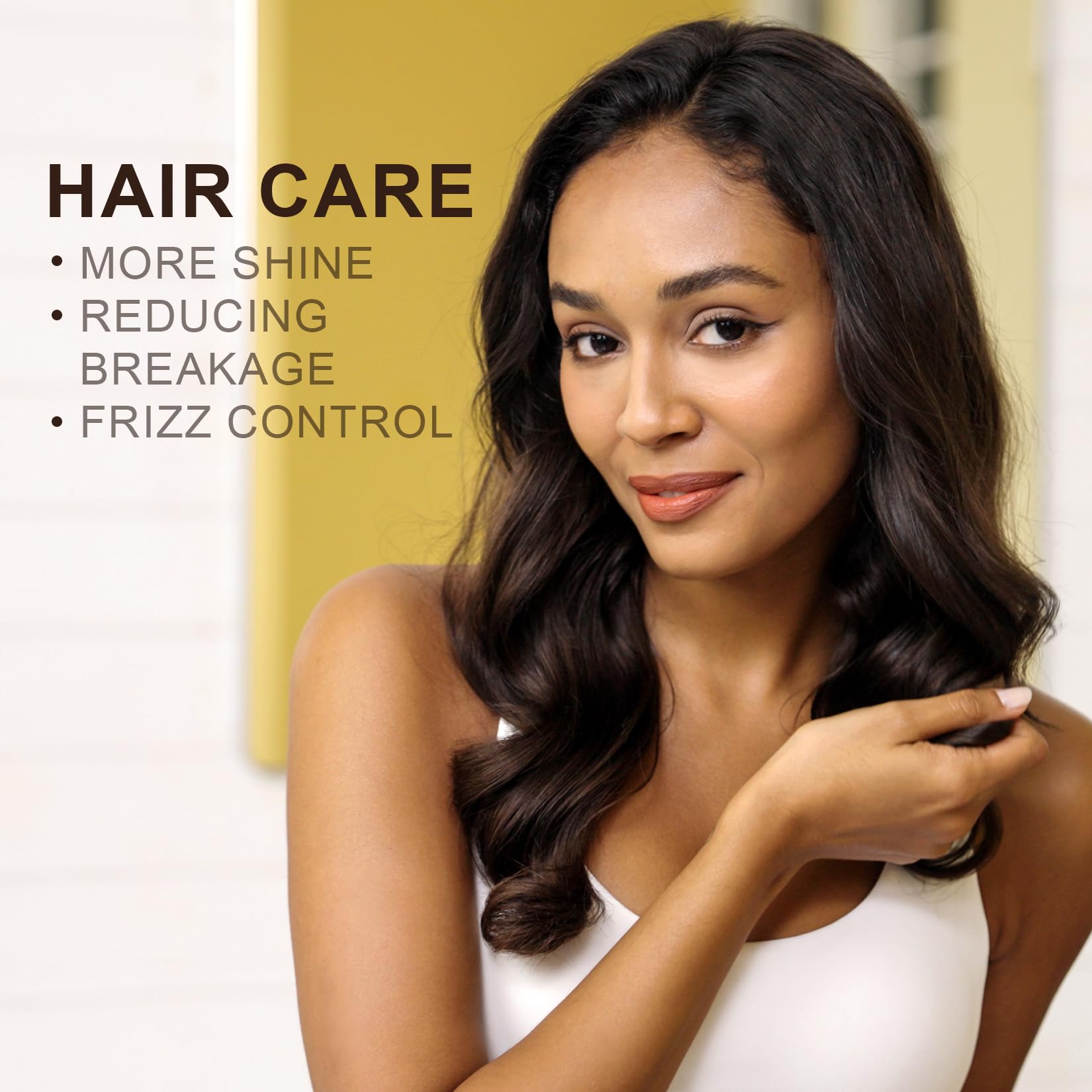 Yoken Argan Oil drops on hair highlight frizz control and shine potential.
