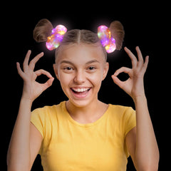 Yomwig LED scrunchies worn in hair create an easy-to-spot accessory at events