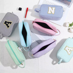 YOOLIFE pink cosmetic bag showing chenille letter stitching detail