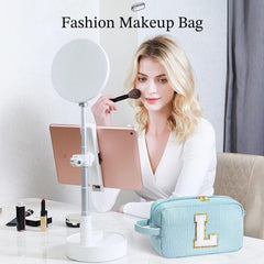 YOOLIFE travel-size monogram bag fits easily in luggage.
