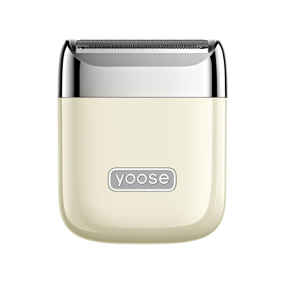 Yoose electric razor for women in porcelain white, top view, portable grooming on the go.