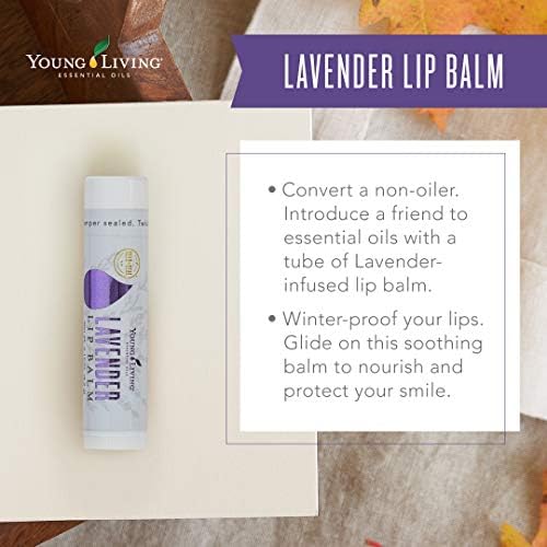 Young Living Lip Balm on hand demonstrates portable hydration for daily use.