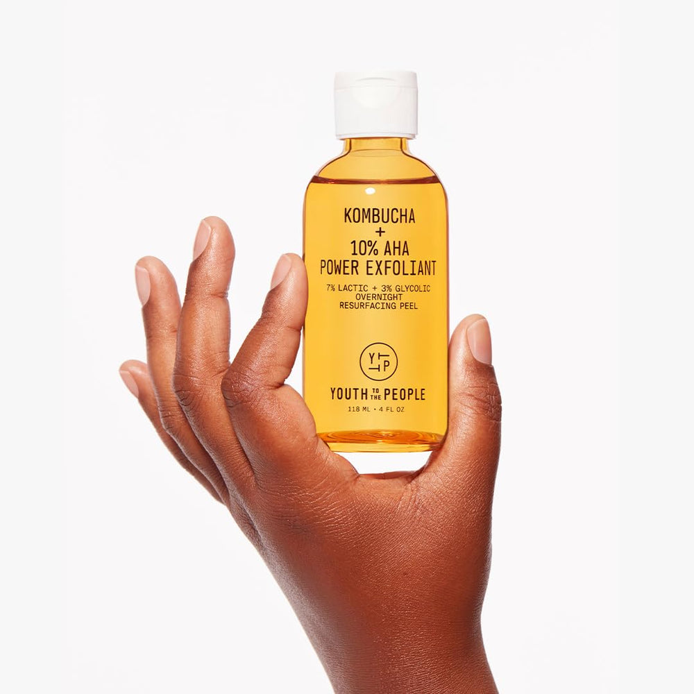 Nighttime skincare routine scene featuring the AHA exfoliant