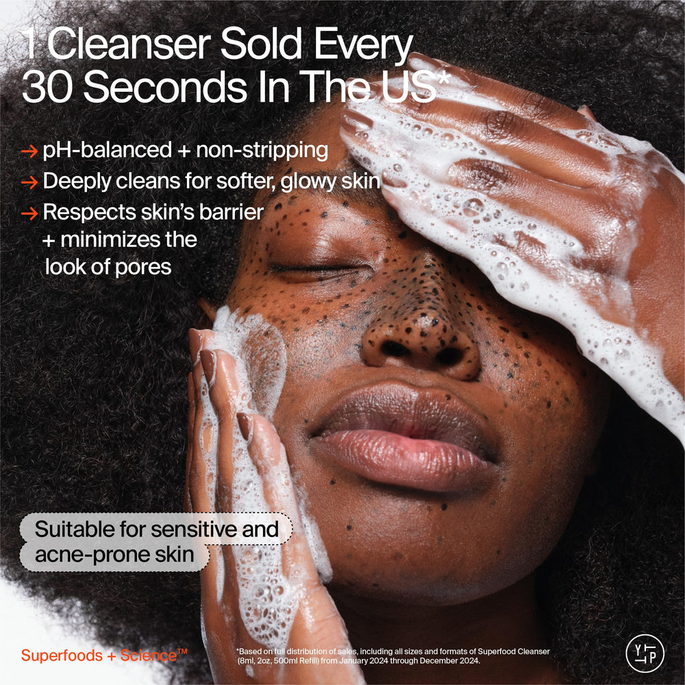 Youth To The People glass bottle close-up emphasizing reusable design for eco-friendly skincare.