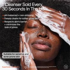 Youth To The People glass bottle close-up emphasizing reusable design for eco-friendly skincare.