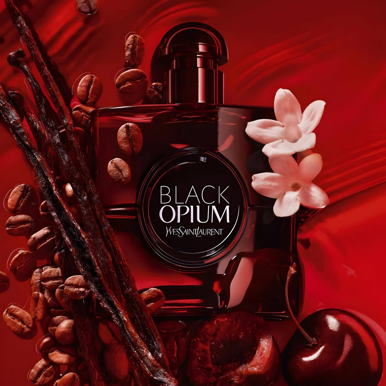 YSL Black Opium Over Red bottle close-up highlights the coffee-vanilla gourmand scent.