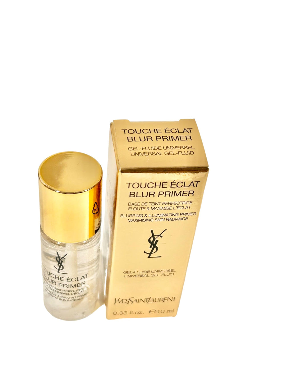 YSL Touche Eclat Blur Primer Mini swatch on skin shows smoothing glow and pore-blurring effect.