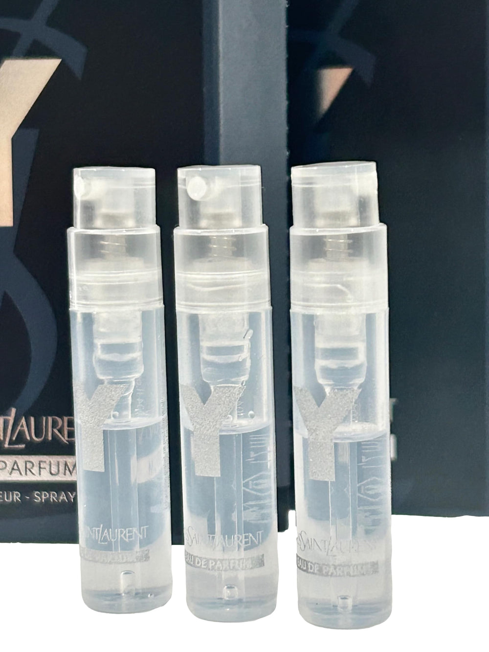 YSL Y Men EDP close-up dispense vial, convenient sample for spontaneous scent exploration.