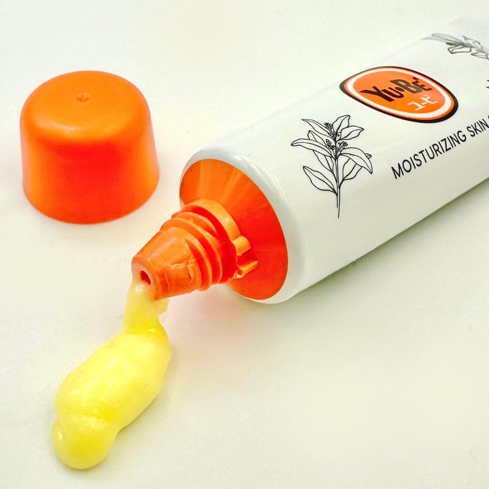Yu-Be Moisturizing Skin Cream Tube on face for daily hydration