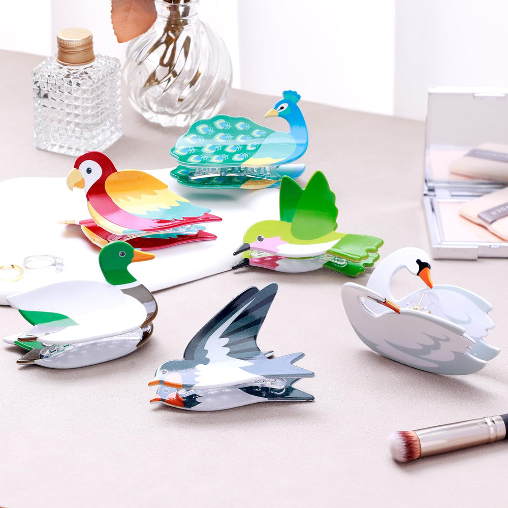 Yussti Birds clips in swallow style brighten daily looks and stay in place during activities.
