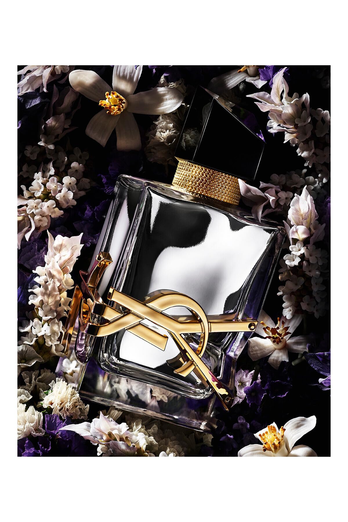 YSL Libre LAbsolu Platine spray application showing long-lasting scent potential.