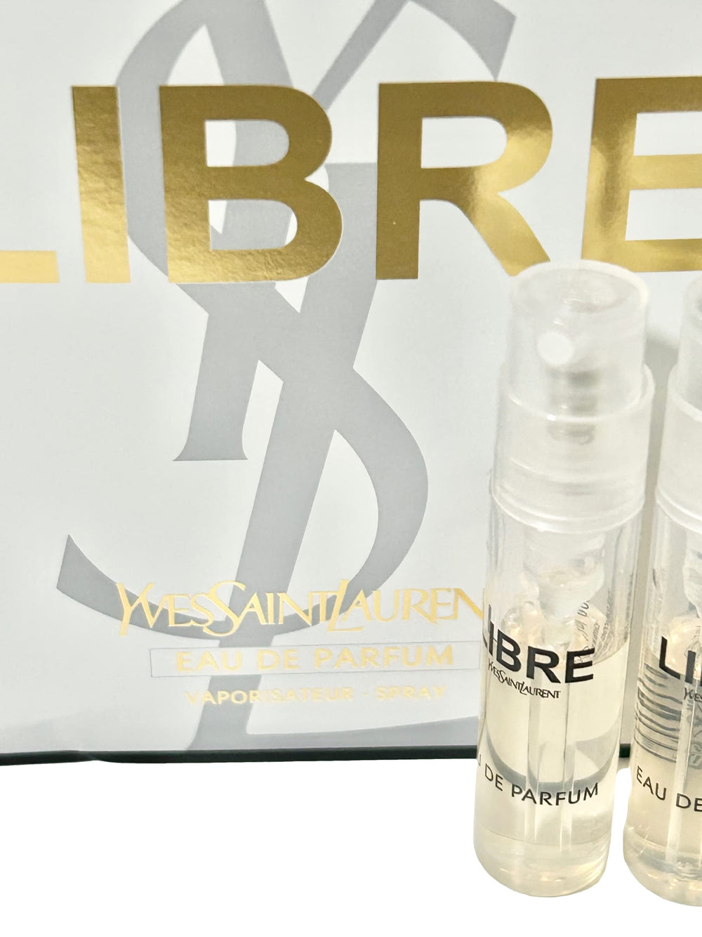Yves Saint Laurent Libre sample application closeup—easy spray for quick scent checks.