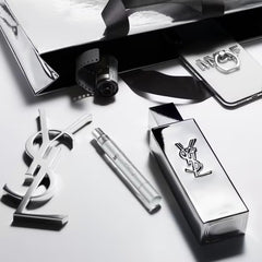 YSL MYSLF ABSOLU travel spray highlighting orange blossom and warm woods for daily confidence and scent trail.