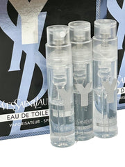 YSL Y Men sample EDT set display showing three partial vials for testing and comparison.
