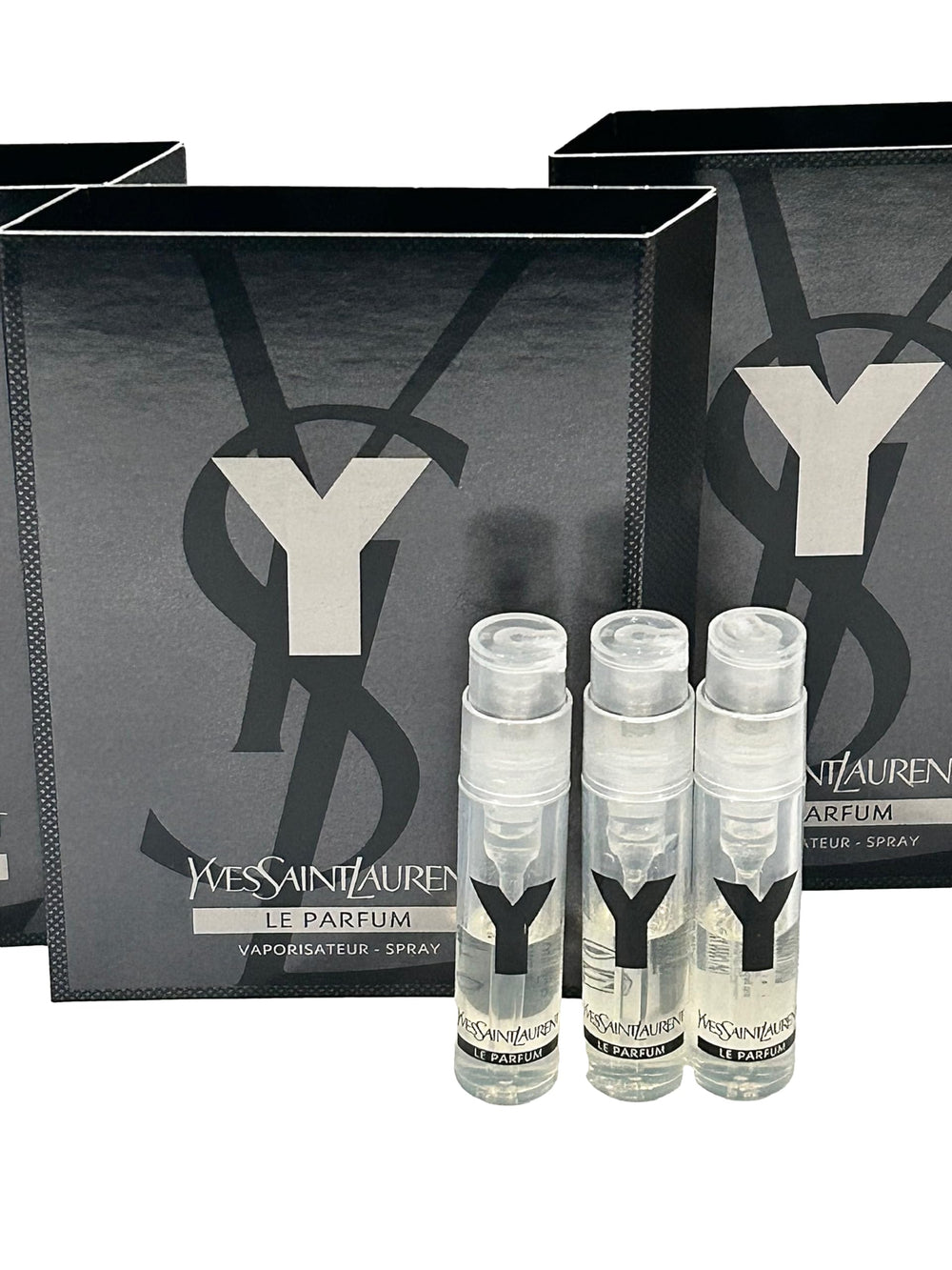 Yves Saint Laurent Y Men partially-filled vials for testing displayed together.