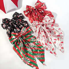 YWAOAIJD Christmas satin bow santa clip adds whimsy to seasonal celebrations.