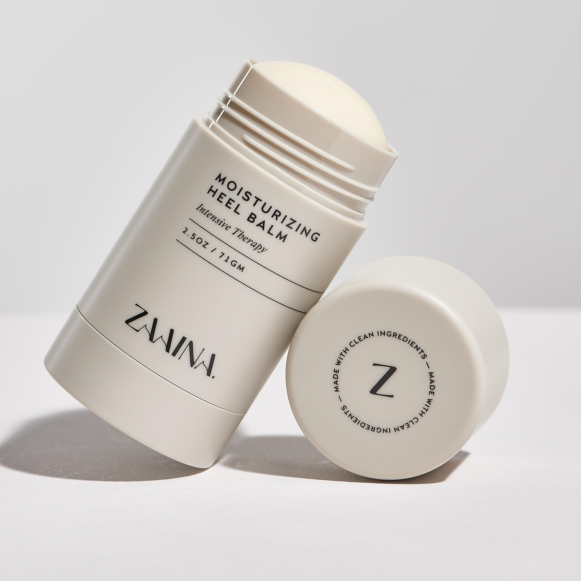ZAAINA whiskey candle scene closeup suggests spa-at-home relaxation ambiance.