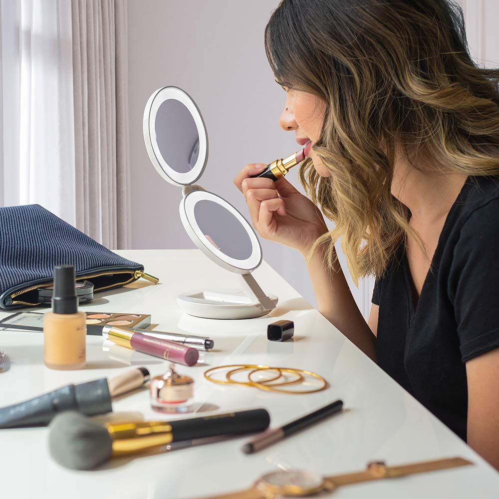 Zadro travel mirror open in upright stand for hands-free makeup