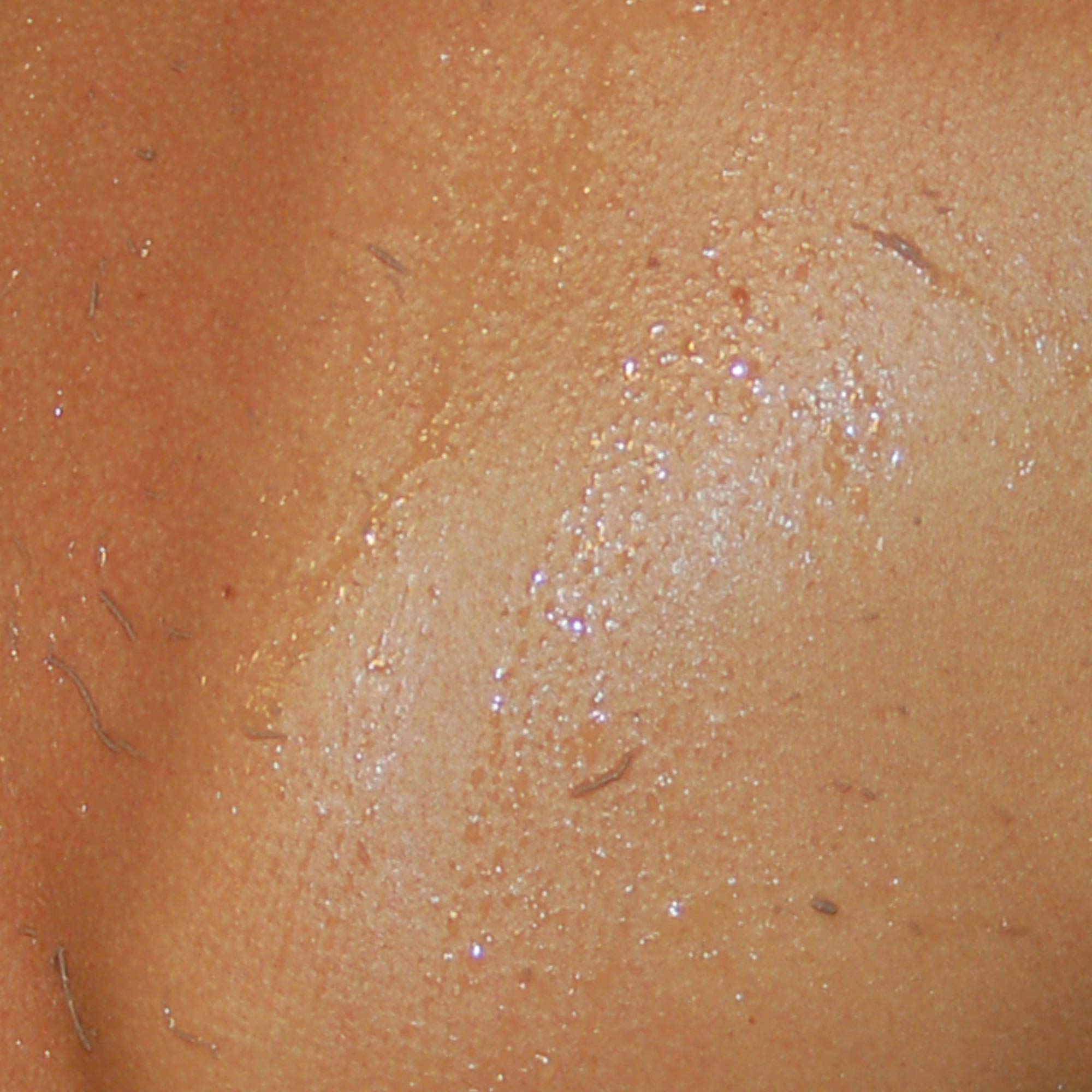 Zakia's Morocco Original Kessa Glove on hand demonstrates non-scratch exfoliation for smoother skin