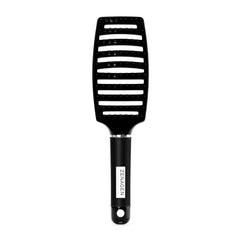 Zenagen Zen Brush black bristles glide through hair for gentle detangling.