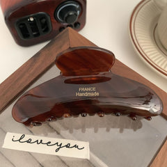 ZHOUMEIWENSP French butterfly clip thick hair secured by large teeth.