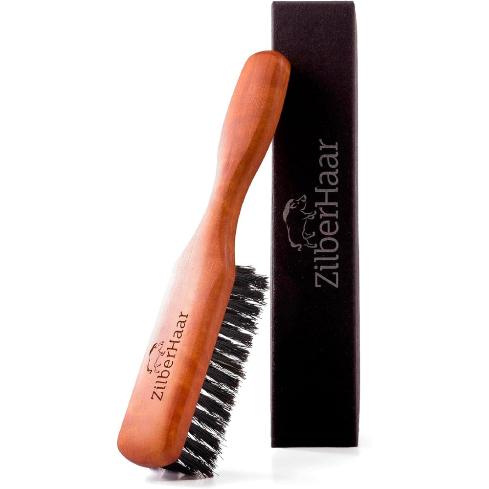 ZilberHaar beard brush with stiff boar bristles for thorough grooming and oil distribution.