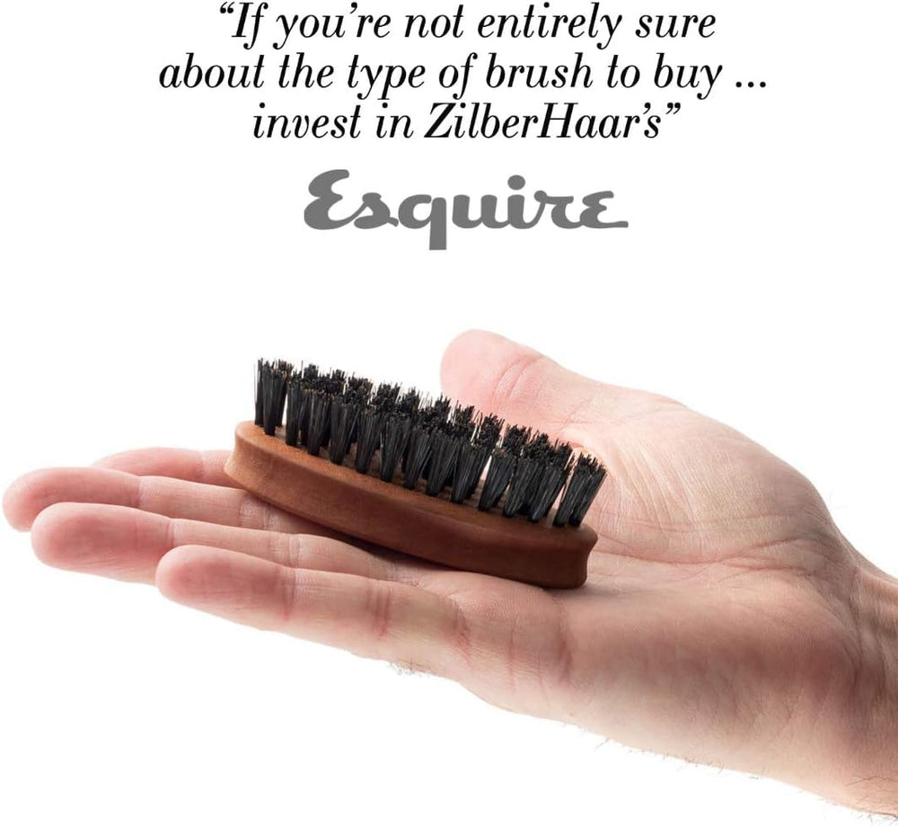 ZilberHaar travel-size brush suitable for 3 inch by 1 inch grooming on the go.