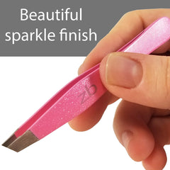 Zizzili Basics bubblegum pink tweezers with protective pouch for travel hygiene and storage.